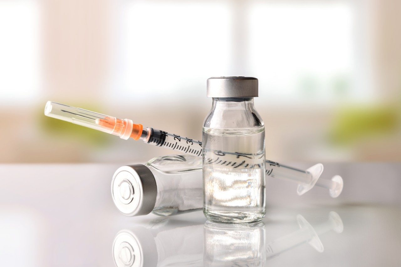 Vials with medication and syringe